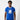 Black male model wearing Sigma Flocked Ringer T-Shirt in blue, showcasing textured flocked Sigma shield on white background.